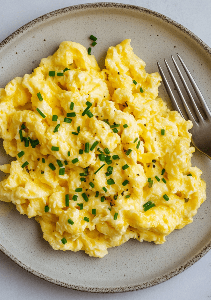 Creamy High-Protein Scrambled Eggs packed with cottage cheese and spinach for a filling, nutritious breakfast in under 10 min!