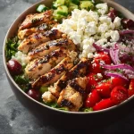 Healthy Mediterranean Chicken Bowl with fresh vegetables and grilled chicken