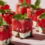 Watermelon mint feta bites served on a platter for a refreshing appetizer.