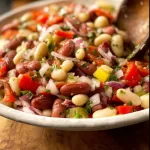 Zesty Italian Bean Salad with colorful beans and fresh vegetables