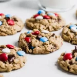 Colorful 4th of July Monster Cookies with festive sprinkles and chocolate chips.