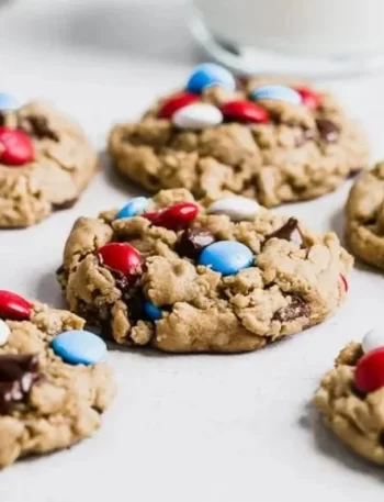 Colorful 4th of July Monster Cookies with festive sprinkles and chocolate chips.