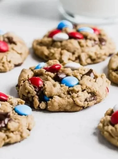Colorful 4th of July Monster Cookies with festive sprinkles and chocolate chips.