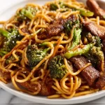 Plate of Beef and Broccoli Lo Mein Noodles with tender beef and fresh vegetables