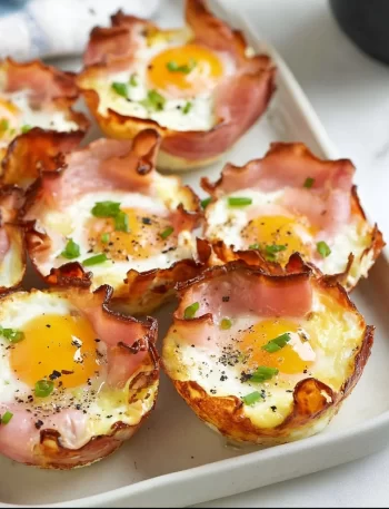 Ham and Cheese Egg Cups served on a plate
