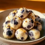 Delicious Lemon Blueberry Cottage Cheese Protein Bites on a white plate