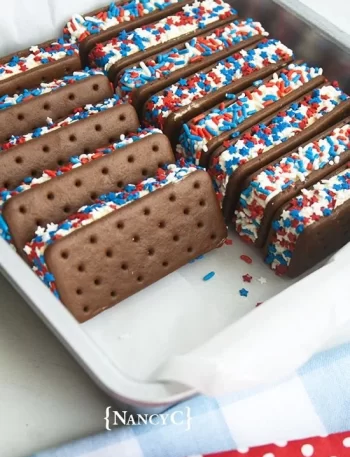 Patriotic ice cream sandwiches decorated with red, white, and blue colors.