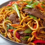 Delicious beef lo mein with colorful vegetables and noodles