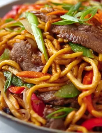 Delicious beef lo mein with colorful vegetables and noodles