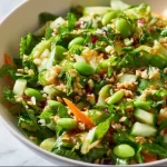 High protein Asian salad with colorful vegetables and savory dressing