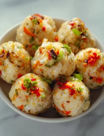 A plate of colorful veggie rice balls made from fresh vegetables and rice