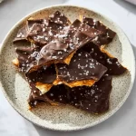 Viral chocolate banana bark dessert with sliced bananas and melted chocolate.