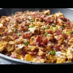 Delicious Blackstone Chicken Bacon Ranch Skillet with bacon and ranch flavor