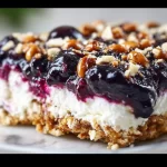 Delicious Blueberry Pretzel Salad dessert with a crunchy pretzel crust.