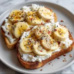 Cottage Cheese and Banana Toast topped with slices of banana.