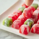 Homemade watermelon mochi dessert on a plate.