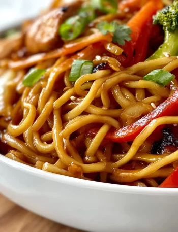 Delicious easy Blackstone Lo Mein served in a bowl with colorful vegetables