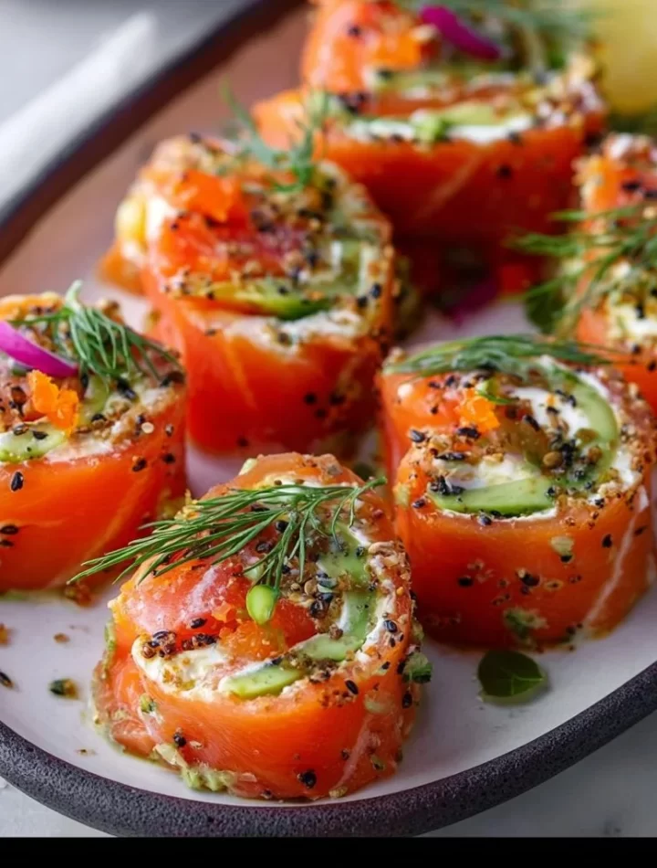 Easy smoked salmon roll ups ready to serve on a platter