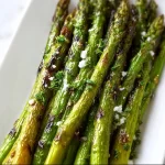 Healthy Blackstone asparagus cooked on a grill for a colorful dish.