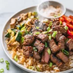 Delicious hibachi steak cooked to perfection on a grill.