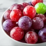 Delicious Kool-Aid Grapes, a colorful and sweet snack for all ages.