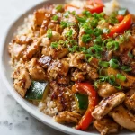 Delicious hibachi chicken dish served in a pan with colorful vegetables