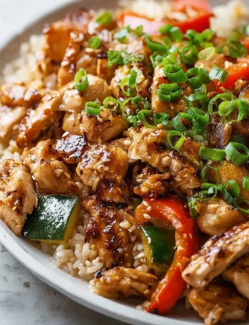 Delicious hibachi chicken dish served in a pan with colorful vegetables