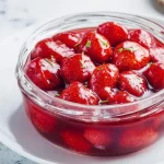 Delicious homemade strawberry compote in a glass jar