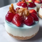 A vibrant summer dessert featuring fresh fruits and a creamy topping.