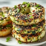 Homemade zucchini bagels ready to be served with cream cheese.