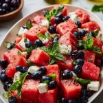 Colorful watermelon blueberry salad with mint and feta cheese
