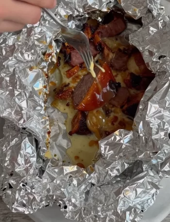 Cajun campsite foil pack for a quick campfire dinner