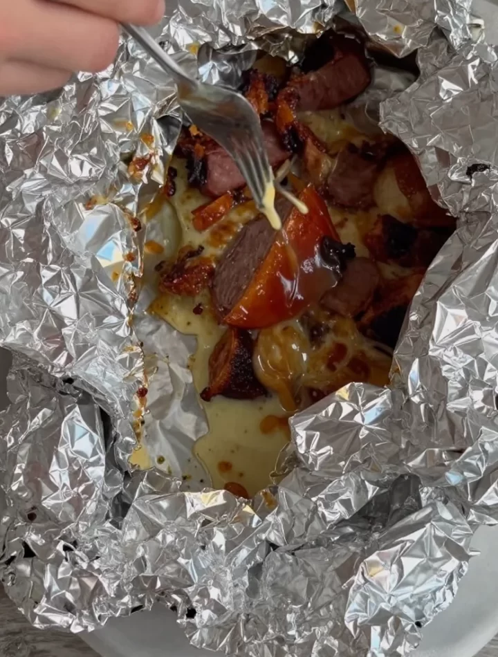 Cajun campsite foil pack for a quick campfire dinner