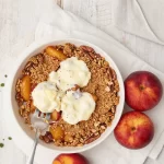 Delicious easy summer nectarine crisp with cinnamon oat-pecan streusel topping