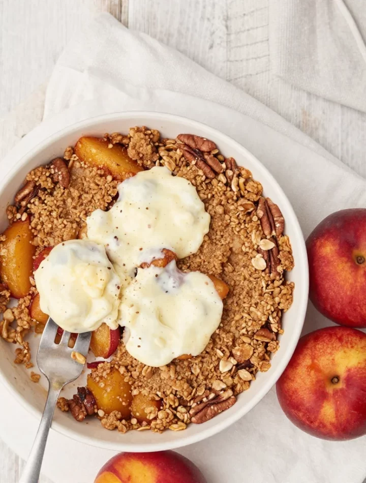 Delicious easy summer nectarine crisp with cinnamon oat-pecan streusel topping
