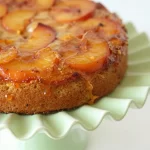 Delicious nectarine upside-down cake served on a plate
