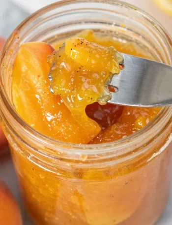 Homemade peach jam made with fresh ingredients in a jar