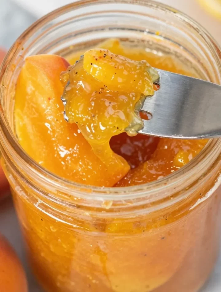 Homemade peach jam made with fresh ingredients in a jar
