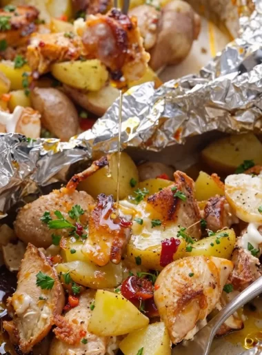 One-pan chicken and potato foil packs ready for a weeknight dinner