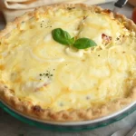 Delicious Southern Tomato Pie, a summer comfort food classic with fresh tomatoes.