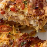 Crispy bacon onion tomato pie served in a one-pan dish for weeknight dinners.