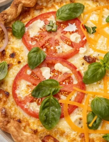 Delicious weeknight tomato pie with crispy crust and fresh tomatoes