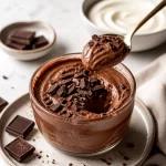 High-protein dark chocolate velvet mousse in a dessert cup