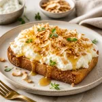 Quick and easy protein toast topped with toasted coconut for a healthy weeknight meal.