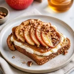 Delicious Minute Ricotta Apple Butter Toast topped with fresh apples and creamy ricotta