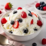 Protein yogurt snow topped with fresh berries in a bowl